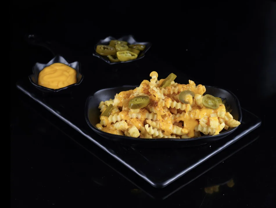 Bash Burger Loaded Fries with cheese and jalapeños